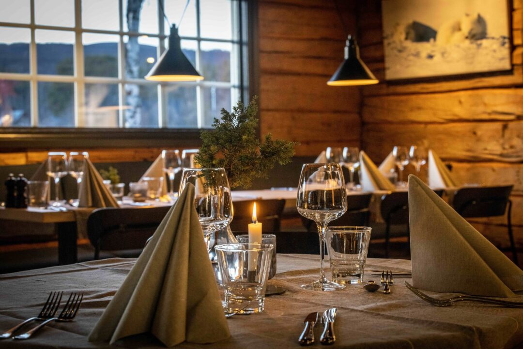 Cozy restaurant setting with elegant tableware in Sweden