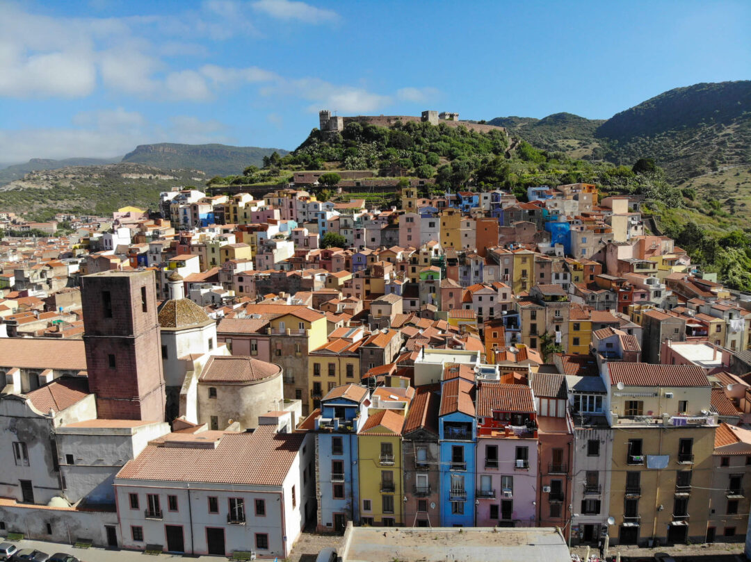 Hillside town with a fortress and terracotta rooftops, Sardinia