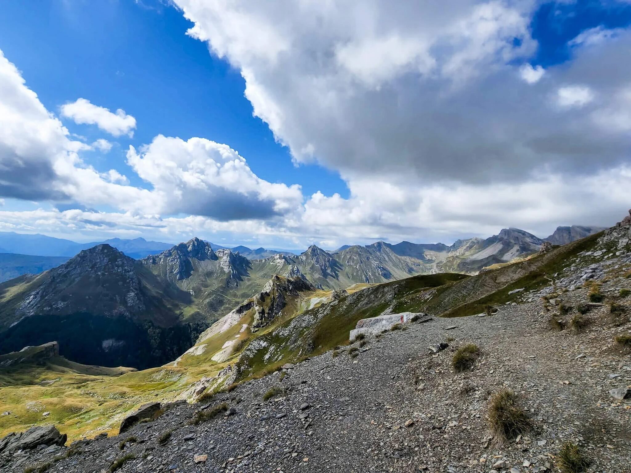 Mountain ridge landscape with rocky slopes and dramatic clouds in North Macedonia