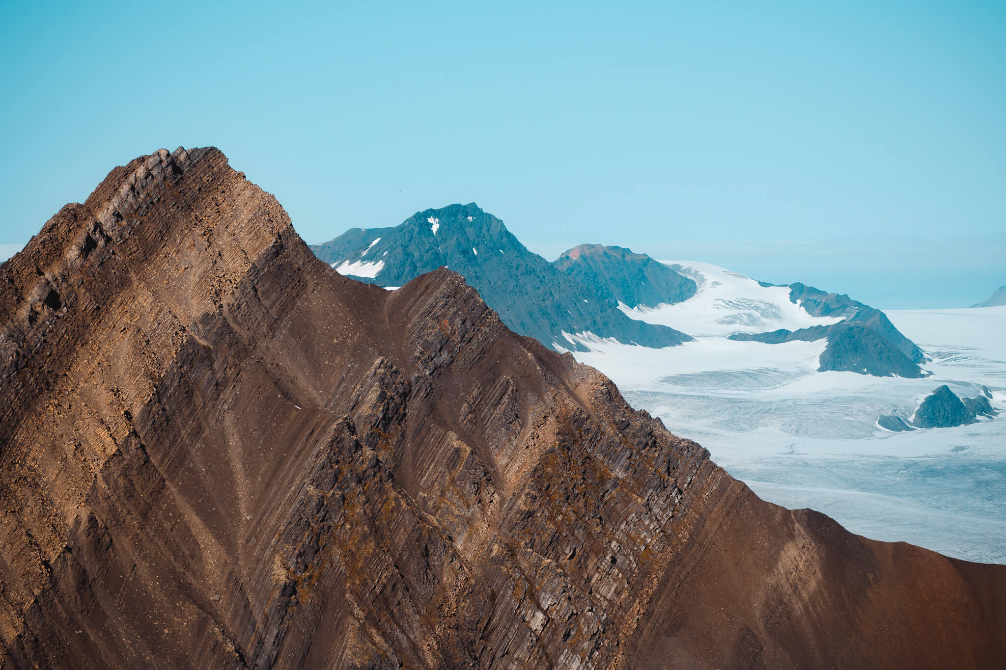 Rugged mountains and glaciers in the Arctic near Svalbard wilderness landscape