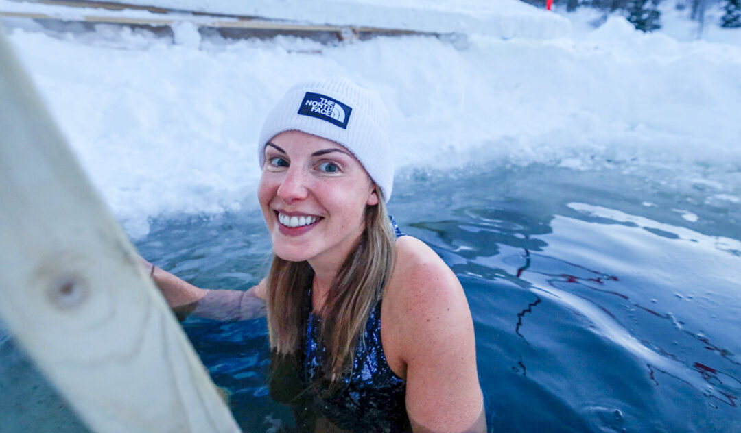 Woman enjoying a winter plunge in Sweden