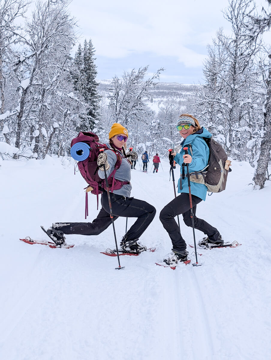 Two women snowshoeing in Sweden
