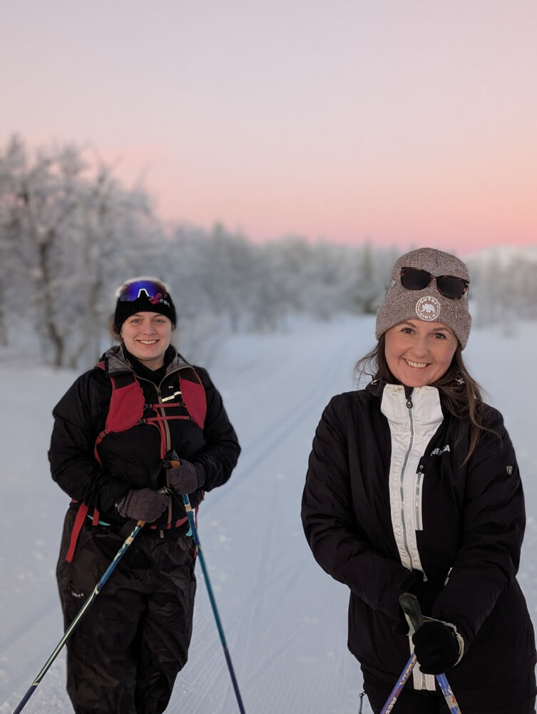 Two women enjoying winter cross country skiing