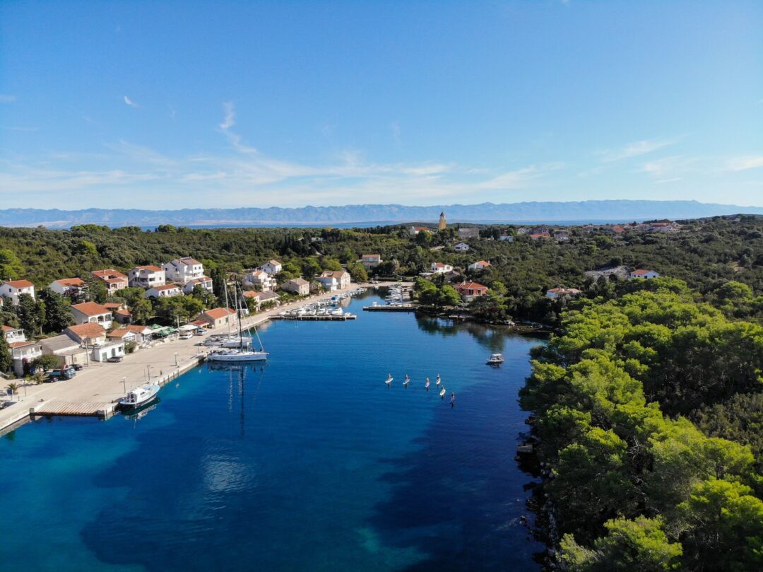 Aerial view of Zadar waterfront marina and harbour with boats on calm blue water