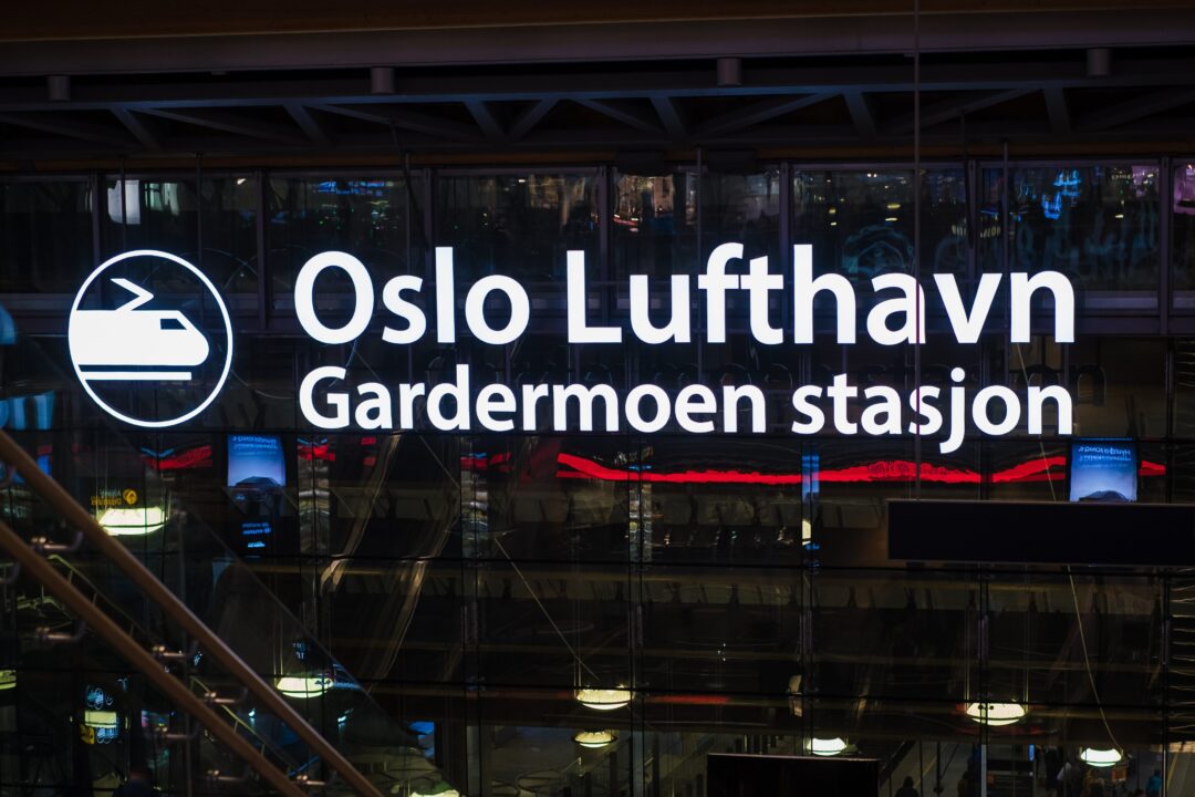 Oslo Lufthavn Gardermoen station sign with directions, for travel to Ringebu Station from the airport