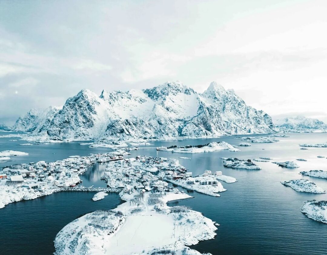 Icy fjord in North Iceland with sea ice and snow-covered mountains