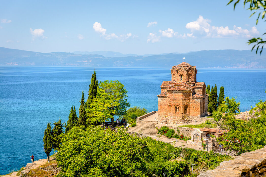 Lake Ohrid view with medieval church and monastery on the shoreline in North Macedonia