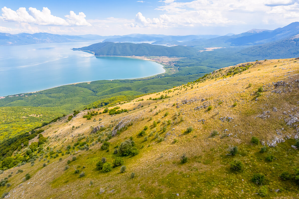 Lake Ohrid shoreline and mountains in North Macedonia, aerial view from a hillside viewpoint