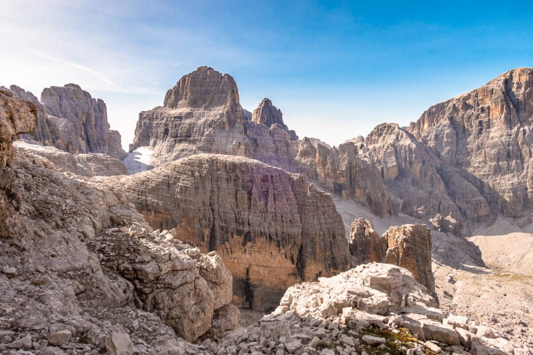 Dolomites rugged mountain cliffs and rocky trail on a via ferrata route