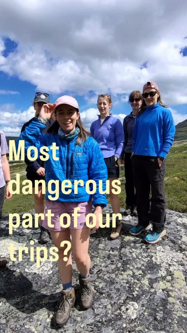 Women hiking on a rocky hill under a cloudy sky; “Most dangerous part of our trips?” text overlay
