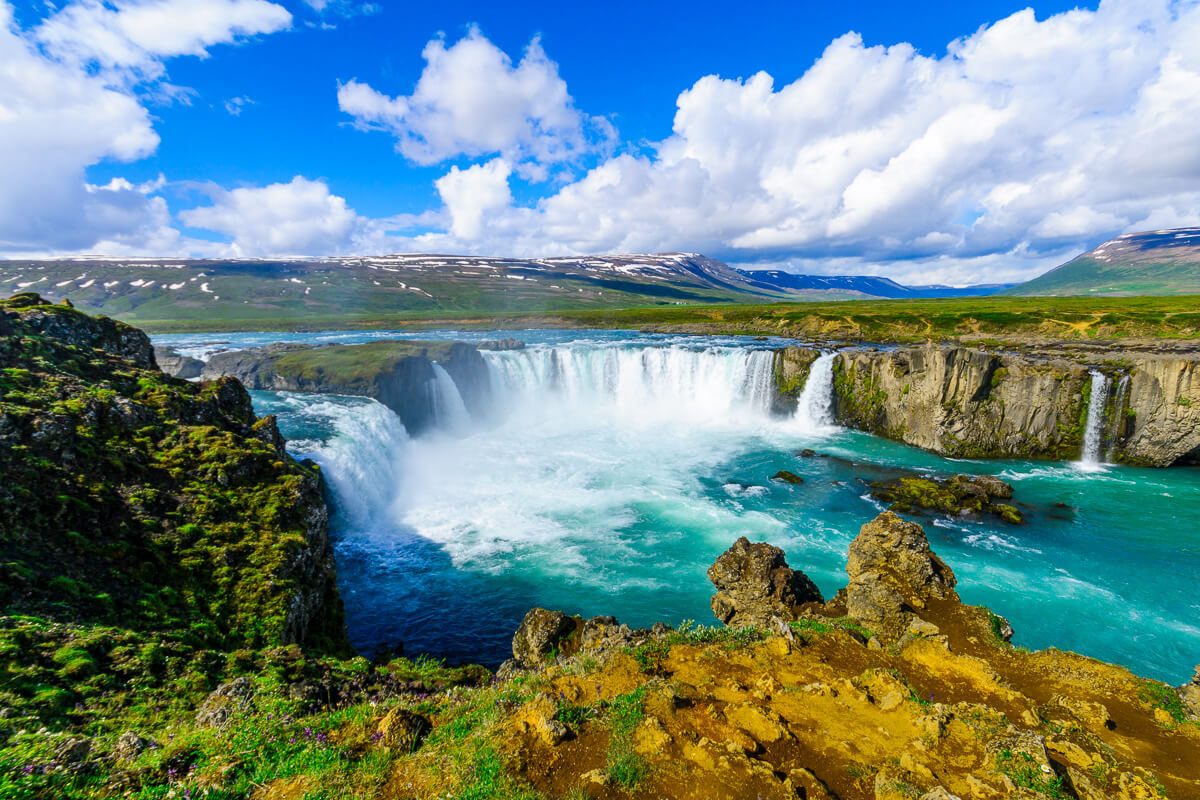 godafoss waterfall with cloudy ski in Iceland