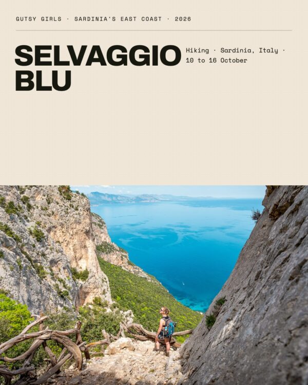 Hiking Selvaggio Blu, Sardinia: woman trekking on rocky coast above the blue sea, Gutsy Girls 10–16 October 2026.