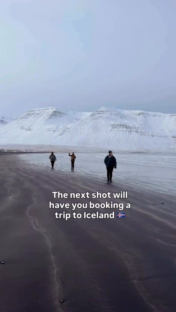 Women walking on a snowy Iceland beach; “The next shot will have you booking a trip to Iceland” 🇮🇸